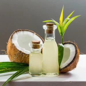 Fireflycoconutoilin2bottlesonein500mlanotherin1lwithacoconutinsideandwhiebackgrou Fireflycoconutoilin2bottlesonein500mlanotherin1lwithacoconutinsideandwhiebackgrou